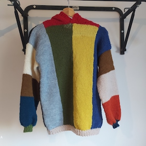 Knitted sweater with hood in wool and alpaca. Boho style, colorful sweater