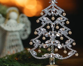 Feel the Magic of Christmas with this table top glass Christmas tree, handcrafted with Clear Czech rhinestone crystals.