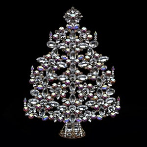 Luxurious  handcrafted vintage christmas tree  with clear rhinestones. Decorated with a Christmas star and delicate shaped flamed candles.