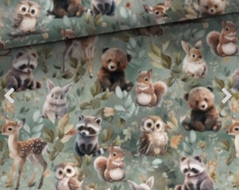 May include: A green fabric with a repeating pattern of woodland animals. The animals include owls, raccoons, squirrels, deer, bears, and rabbits. The fabric is perfect for crafting projects, quilting, and sewing.