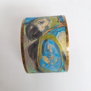 Silk cuff bracelet with parrot