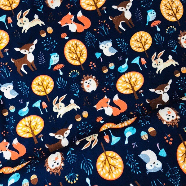 Tela infantil de jersey Miss by Julie animales del bosque azul azul oscuro marrón naranja ciervo zorro conejo búho mapache árboles hojas tela de colores