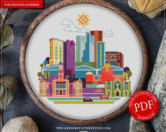 May include: A cross-stitch pattern of the Fort Worth skyline in a wooden embroidery hoop. The design features colorful buildings, a sun, and the text "Fort Worth." The pattern is for instant download and includes 18 colors.