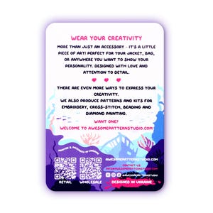 May include: A white, purple, and blue card with text that reads "WEAR YOUR CREATIVITY" and "AWESOMEPATTERNSTUDIO.COM". The card promotes embroidery, cross-stitch, beading, and diamond painting kits. The card is designed in Ukraine.