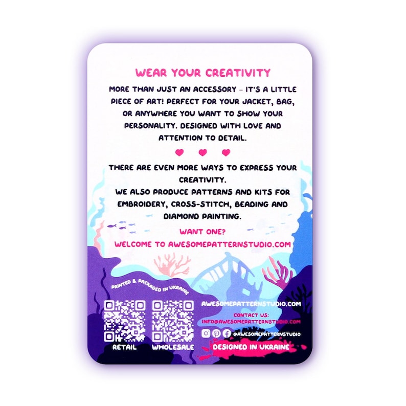 May include: A white, purple, and blue card with text that reads "WEAR YOUR CREATIVITY" and "AWESOMEPATTERNSTUDIO.COM". The card promotes embroidery, cross-stitch, beading, and diamond painting kits. The card is designed in Ukraine.