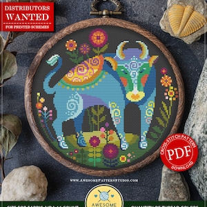 May include: A counted cross stitch pattern for instant download featuring a colourful bull with flowers and birds. The pattern is for Aida 16 count fabric, 115 x 113 stitches, and uses 25 DMC colours. The pattern is available as a PDF download.