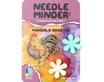 May include: A needle minder set with a mandala rooster design. The set includes a colourful rooster pin and two flower-shaped needle minders. The packaging has the text "NEEDLE MINDER" and "MANDALA ROOSTER" printed on it.