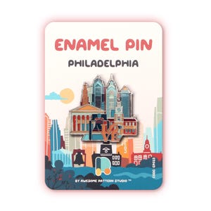 Może przedstawiać: Emaliowana przypinka przedstawiająca panoramę Filadelfii z rzeźbą LOVE, umieszczona na karcie z napisami ENAMEL PIN PHILADELPHIA, BY AWESOME PATTERN STUDIO oraz CODE: EP023, na tle ilustracji przedstawiającej miasto.