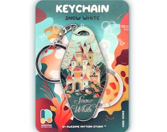 May include: A motel-style keychain featuring a castle illustration with red roofs and the text Snow White. The keychain is attached to a silver metal ring and presented on a backing card with the text KEYCHAIN SNOW WHITE and AWESOME PATTERN STUDIO.