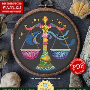 Puede incluir: Un patrón de punto de cruz del signo zodiacal Libra, presentado en un bastidor de bordado de madera. El diseño presenta una balanza colorida con detalles en rosa, azul y amarillo. El texto "COUNTED CROSS STITCH PATTERN" y "PDF DOWNLOAD" son visibles.