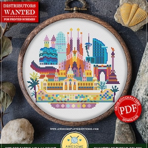 May include: Counted cross stitch pattern for instant download, featuring a colorful cityscape of Barcelona, Spain. The pattern is framed in a wooden hoop and includes 18 DMC colors. The pattern is 106 stitches wide by 92 stitches high, and measures 6.63 inches by 5.75 inches.