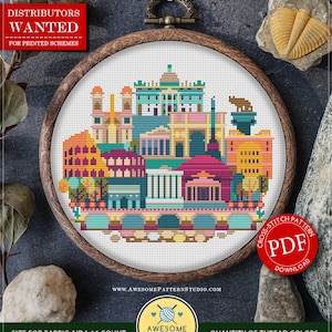 Puede incluir: Patrón de punto de cruz contado para Roma, Italia. El patrón presenta una representación colorida del horizonte de la ciudad, incluyendo el Coliseo, el Panteón y la Fontana de Trevi. El patrón tiene 109 puntos de ancho por 90 puntos de alto y utiliza 18 colores DMC.