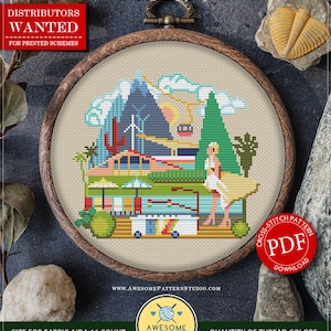 May include: Counted cross stitch pattern for instant download, titled "Palm Springs" with a colorful illustration of a desert landscape with a camper van, palm trees, mountains, and a woman in a white dress. The pattern is 95 stitches wide by 86 stitches high and uses 18 DMC colors.