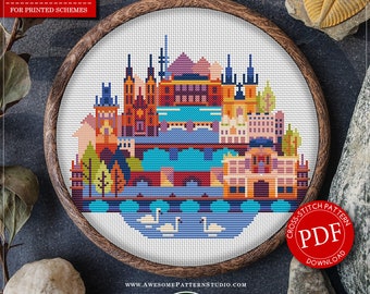 May include: Counted cross stitch pattern for Prague, Czech Republic. The pattern features a colourful cityscape with a river and swans. The pattern is available as a PDF download. The pattern is 111 stitches wide by 94 stitches high and uses 18 colours of DMC thread.