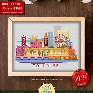 May include: A framed cross-stitch pattern featuring a colorful depiction of Toulouse, France, with the city's skyline and the word "TOULOUSE" below. The pattern is designed for instant download and includes 25 colors. The fabric size is 11.94 x 7.50 inches.