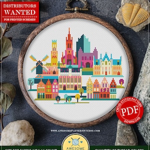 以下が含まれることがあります： 木製の刺繍枠の中に、カラフルな都市景観のデザインが施されたクロスステッチパターン。建物、風車、そして「Bruges」の文字が含まれています。生地のサイズは16.51 x 13.02 cmで、104 x 82ステッチです。即時ダウンロード可能です。