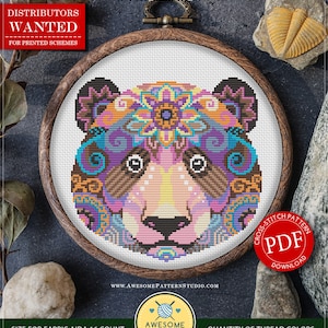 May include: Counted cross stitch pattern for instant download, featuring a colorful mandala bear design. The pattern is in PDF format and includes 20 colors. The finished size is 6.00 x 5.81 inches (15.24 x 14.76 cm) and uses Aida 16 count fabric.