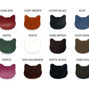 Peut inclure: Douze patchs en cuir en forme de chat dans diff&eacute;rentes couleurs, y compris rouge fonc&eacute;, brun clair, noir brillant, bleu, vert, blanc, brun fonc&eacute;, brun olive, violet, brun rouge ch&ecirc;ne, noir mat et olive fonc&eacute;.