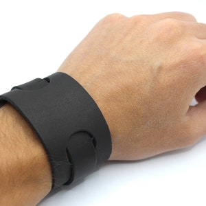 Axel - wide leather wrist cuff strap bracelets perforated black brown color unisex design adjustable by buckle | Woman leather wrist band