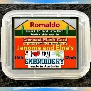 Janome / Elna 32MB CF Card :  A blank brand new CF Card with a back 5 lines writing ID Label and comes with a nice protective case