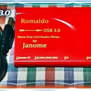 Janome / Elna's Special Card Reader/Writer with USB 3.0 special extension cable also has other all-in-one multi function slots.