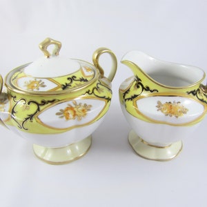 Vintage Nippon Deco handgemaltes gelbes und schwarzes Sahnemilchkännchen und Zuckerset. Hergestellt Japan