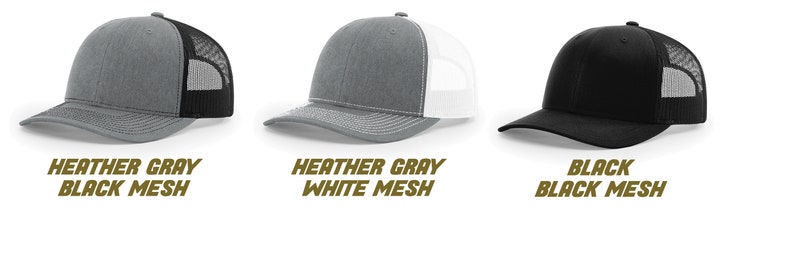May include: Three trucker hats in different color combinations. The first hat is heather gray with a black mesh back. The second hat is heather gray with a white mesh back. The third hat is black with a black mesh back.