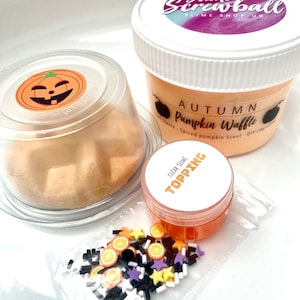 May include: A slime kit featuring a pumpkin-themed slime, clear slime topping, and orange and white sprinkles. The slime is labelled "Autumn Pumpkin Waffle" and has a spiced pumpkin scent. The kit is from Slime Screwball Slime Shop UK.