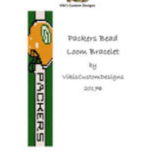 May include: Green and gold bead loom bracelet with a football helmet and the word "Packers" on it.