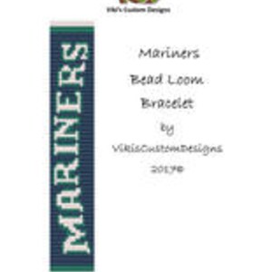 May include: A bead loom bracelet with the word "Mariners" in white letters on a blue background. The bracelet has green and white accents.