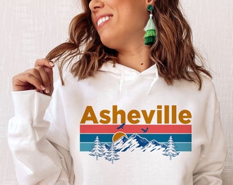 Sudadera con capucha Asheville: sudadera unisex retro con sol de montaña