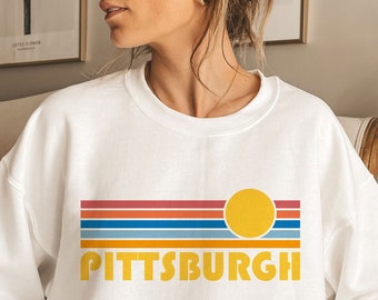 レトロなピッツバーグのスウェットシャツ：ユニセックス、日の出のグラフィック、ペンシルベニアのお土産