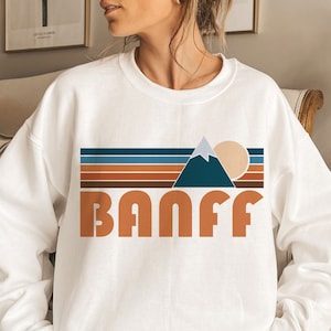 Sweat-shirt Banff Canada : col rond Retro Mountain, coupe unisexe