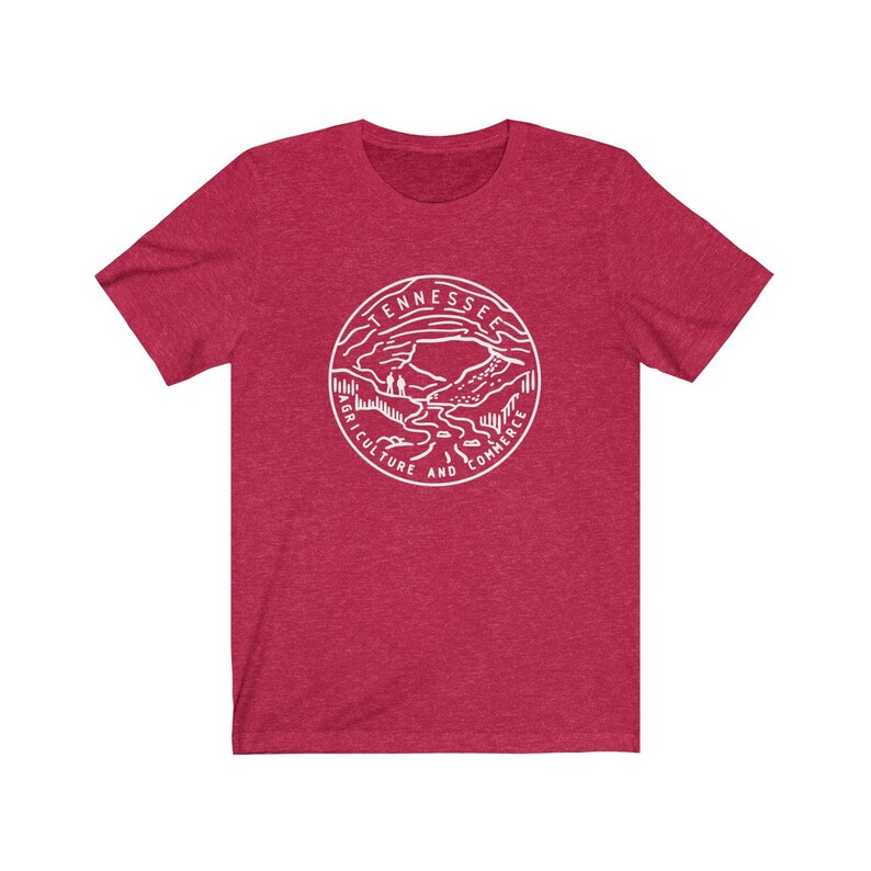 May include: Red heather t-shirt with a white outline of the state of Tennessee seal. The seal features a mountain range, a river, and the words "Tennessee, Agriculture and Commerce".