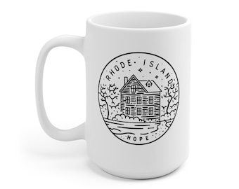 May include: White ceramic mug with a black and white illustration of a house with a river and trees. The text "Rhode Island - Hope" is printed in a circle around the illustration.