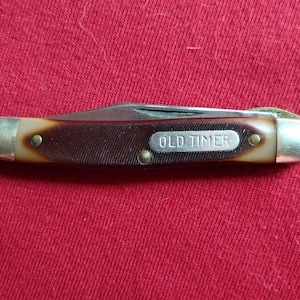 Navaja de bolsillo vintage Schrade Old Timer de una sola hoja con bloqueo de 180 dientes