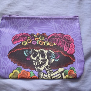 1 Koffer 24**19 cm. Geldbörse - Etui - Kosmetiktasche - Kleine Tasche. Die Catrina. Hergestellt in Mexiko