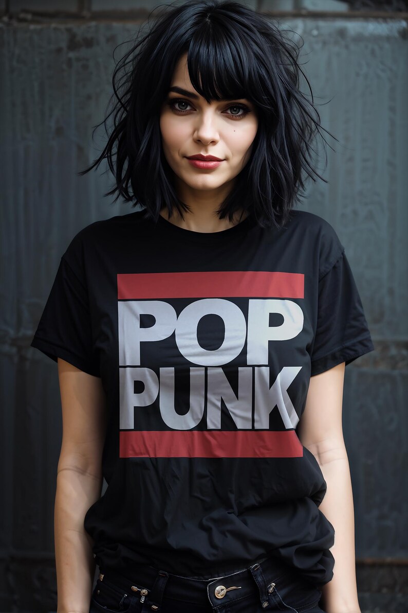 May include: Black t-shirt with the words "POP PUNK" in large white letters, framed by a red and white rectangle. The person in the image has black hair and is wearing the shirt.