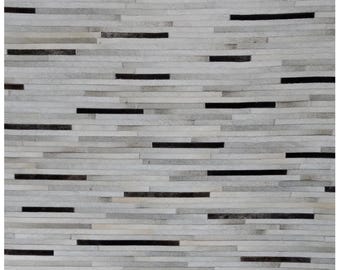 Handmade Cowhide Rug: Genuine Leather, Felt Backing