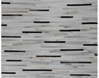 Handcrafted Cowhide Patchwork Rug: Genuine Leather, Felt Backing