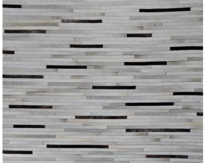 Handcrafted Cowhide Patchwork Rug: Genuine Leather, Felt Backing