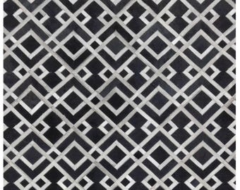 Handcrafted Cowhide Patchwork Rug: Genuine Leather, Felt Backing