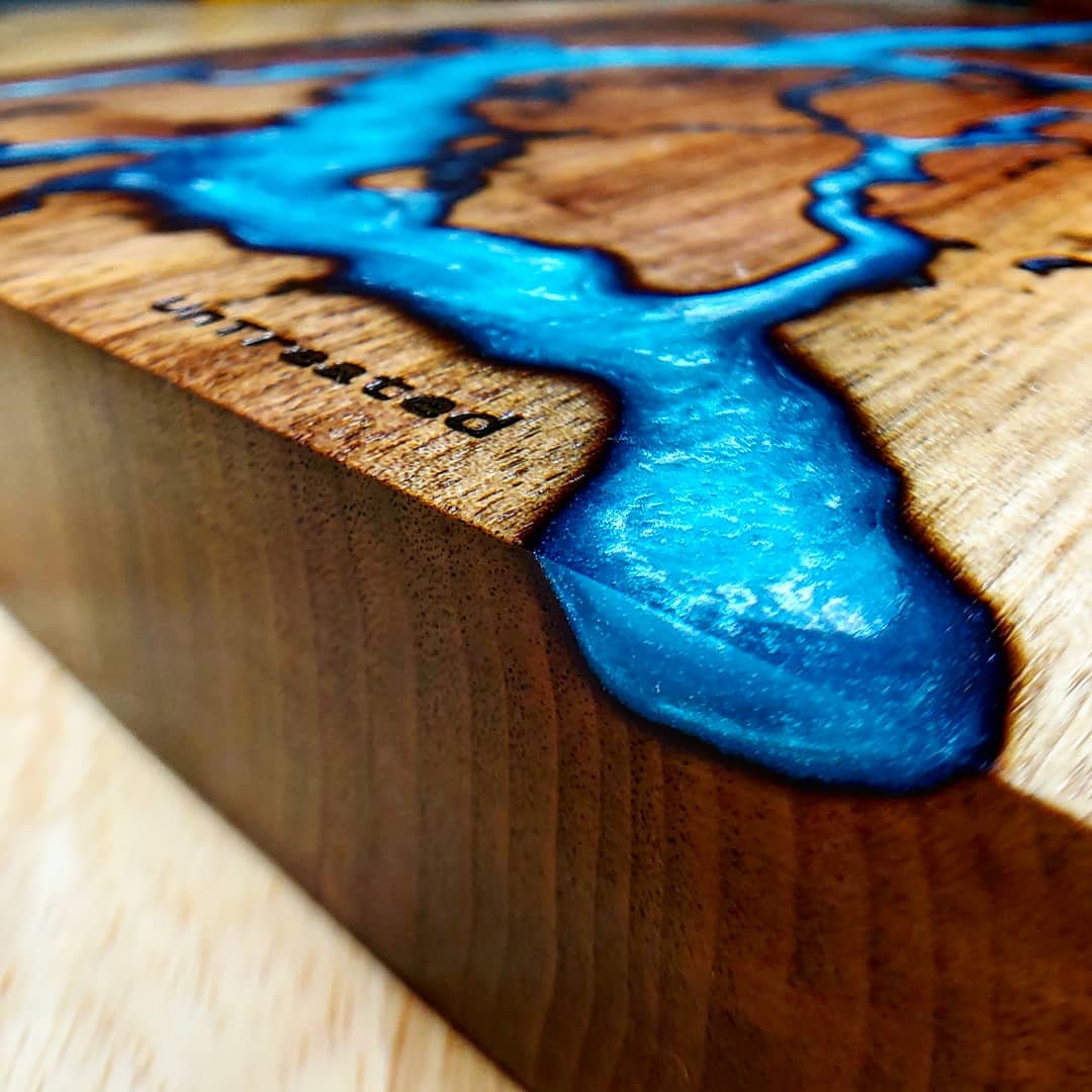 a dark wooden cutting board for charcuterie - South Beach Diet
