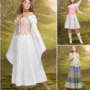 May include: Three different fairy costumes with floral patterns and layered skirts. The first costume features a white bodice with a gold trim and a white layered skirt. The second costume features a pink bodice with a white layered skirt and floral print. The third costume features a green cardigan with a white layered skirt with a purple, green, and white striped pattern.