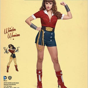 May include: A Simplicity pattern for a Wonder Woman costume. The costume includes a red top with white trim, blue shorts with white stars, a gold belt, and red boots with white stars. The image also features the DC Comics Bombshells logo.