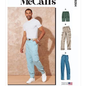 May include: McCall's sewing pattern featuring multiple views of cargo pants. The image shows a person wearing light blue cargo pants. The pattern includes options for shorts, tan cargo pants, and blue jeans. The text reads "Designed and printed in USA."