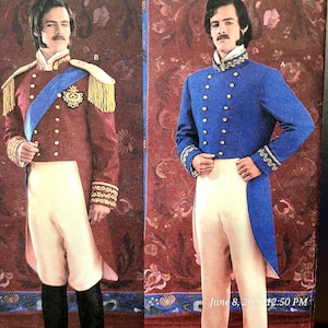 May include: Two formal tailcoats with cream-colored trousers. The left coat is maroon with gold fringe epaulets, a blue sash, and gold buttons. The right coat is blue with gold embroidery on the collar and cuffs, and double-breasted gold buttons.
