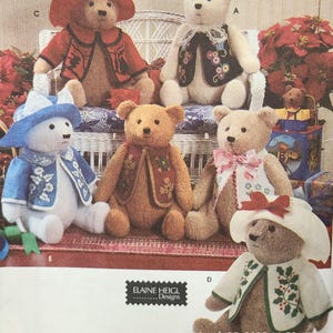 May include: A collection of handmade teddy bears, each uniquely dressed in various outfits. The bears are in different colors, including brown, white, and blue, and are adorned with hats, jackets, and decorative accents. The image includes the text "ELAINE HEIGL Designs".