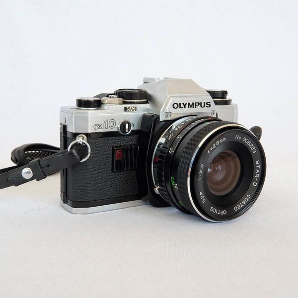 Olympus OM–10 Vintage SLR 35mm Film Camera with Star-D 28mm Lens and Olympus 135mm Lens in Tested Working Condition with New Battery: 1978