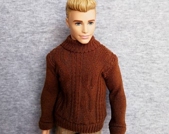 May include: A brown knitted sweater with a turtleneck collar. The sweater has a cable knit pattern and is made of a soft, warm material.